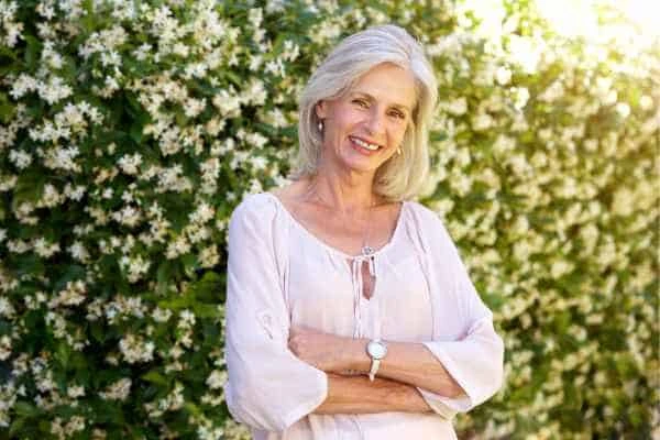 Older woman happy with urinary incontinence treatment Virginia Water